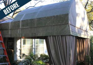 A 'before' image of a large awning with curtains showing years of dirt, mold, mildew and other environmental and biological contaminants.